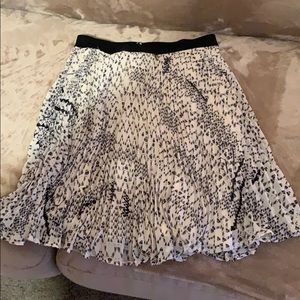 Cute kind of long cream and black skirt